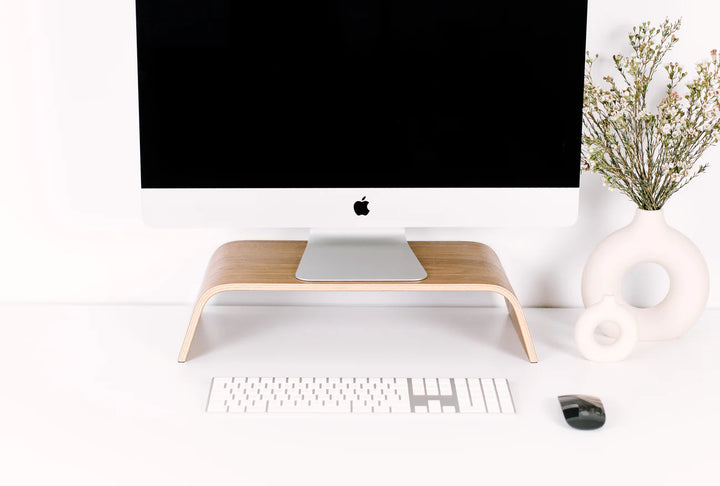walnut halostands monitor mount being used by a Mac
