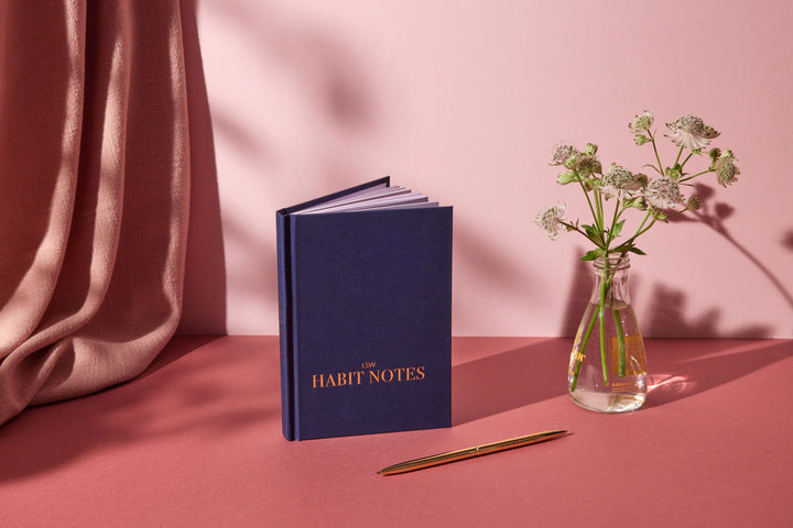 blue LSW book on red table
