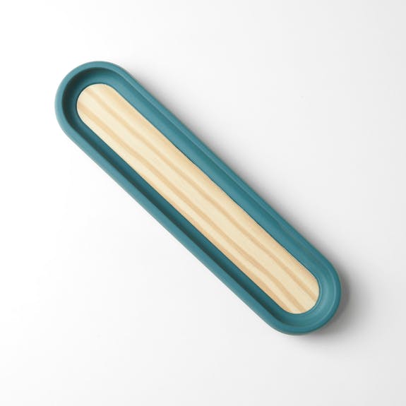 pumping pen tray in blue and wood on white background