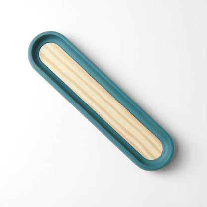 pumping pen tray in blue and wood on white background