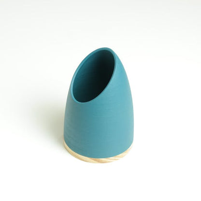 blue wood pen pot on white background