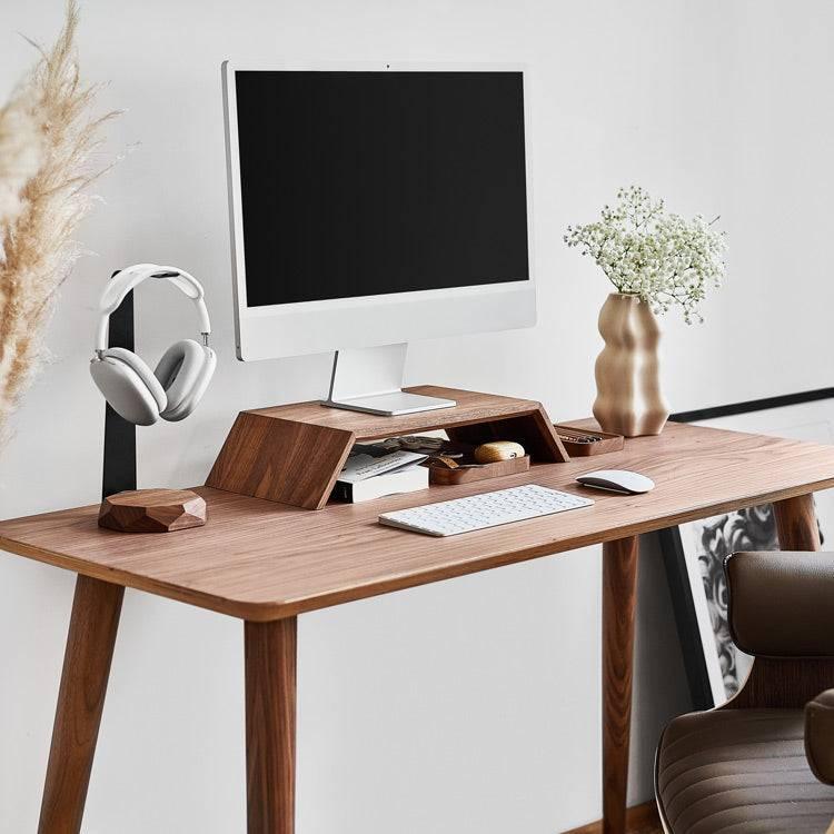 walnut monitor stand on wooden desk alongside various Oakywood office accessories