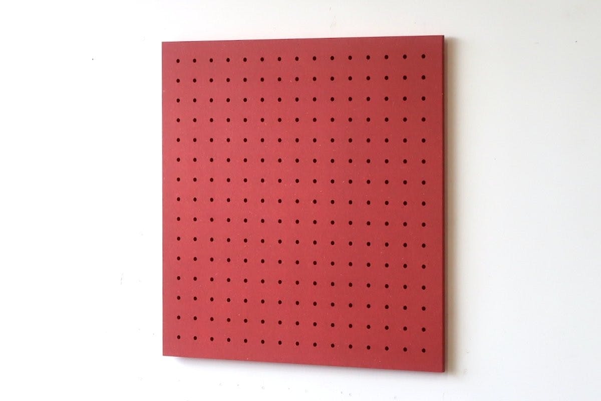 red quark pegboard, empty on white background