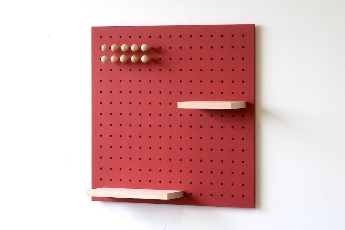 quark pegboard in red with wooden shelves