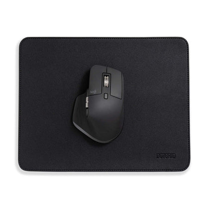 Dotgrid mouse mat in black, with Logitech mouse on top
