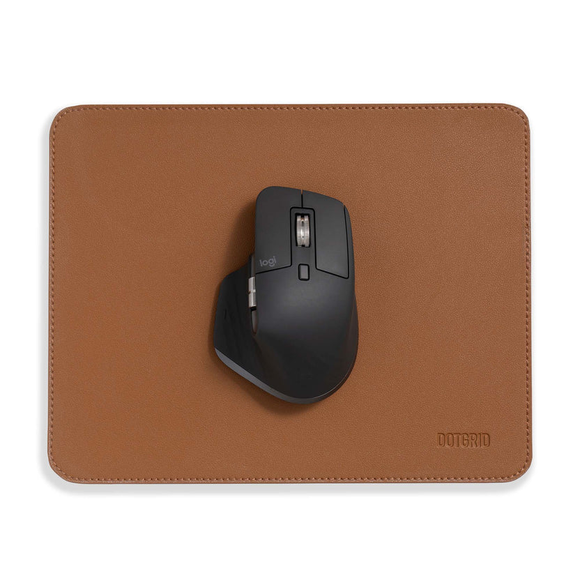 Dotgrid mouse mat with Logitech mx master mouse on top