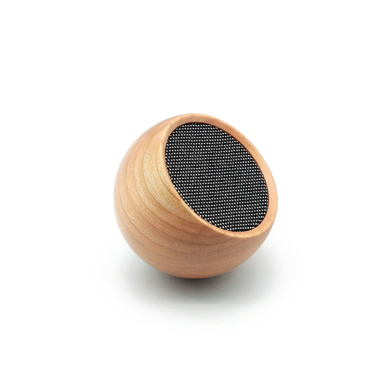 gingko tumbler speaker in oak on white background