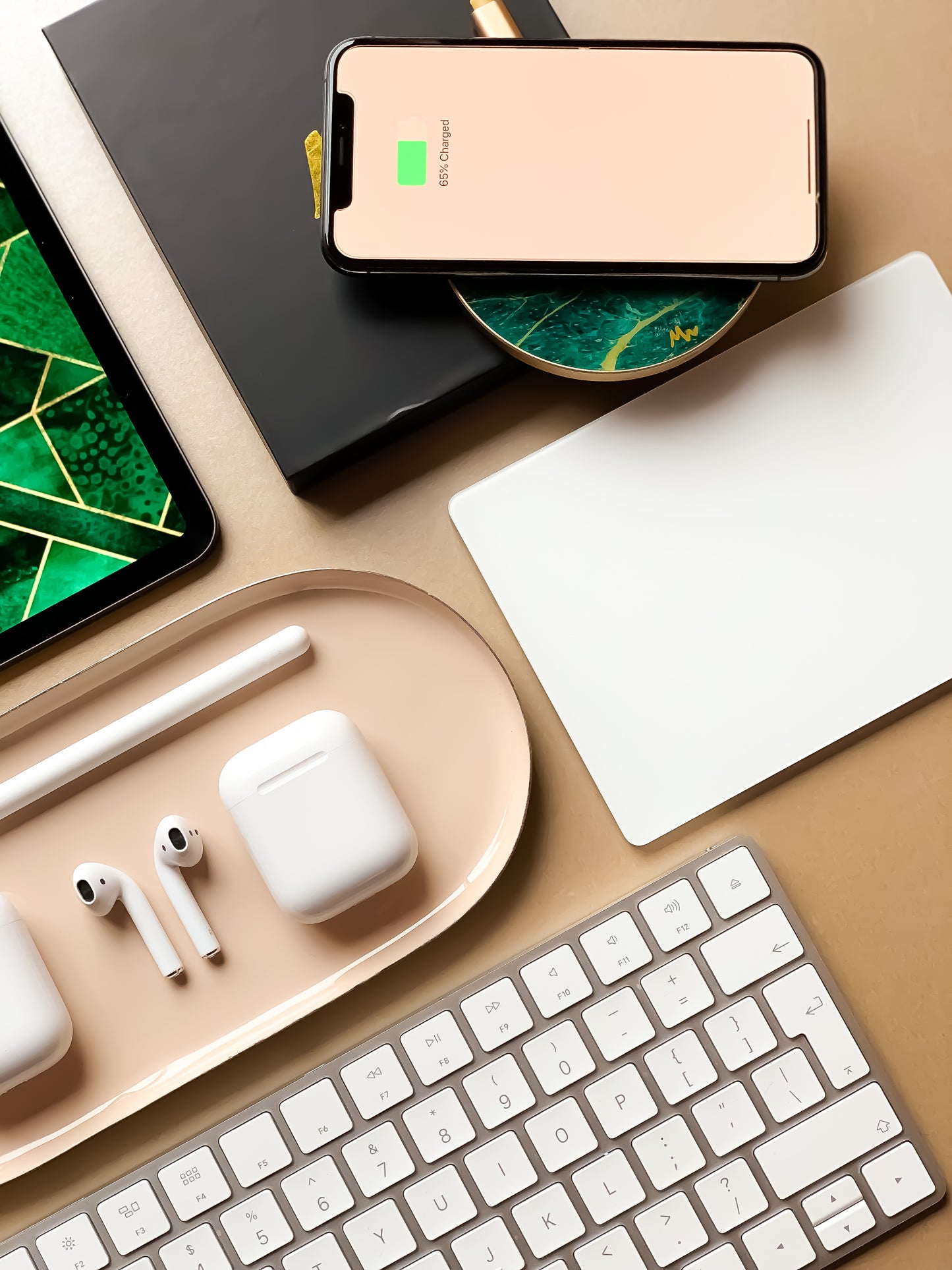 lifestyle image of green wireless charger charging an iPhone