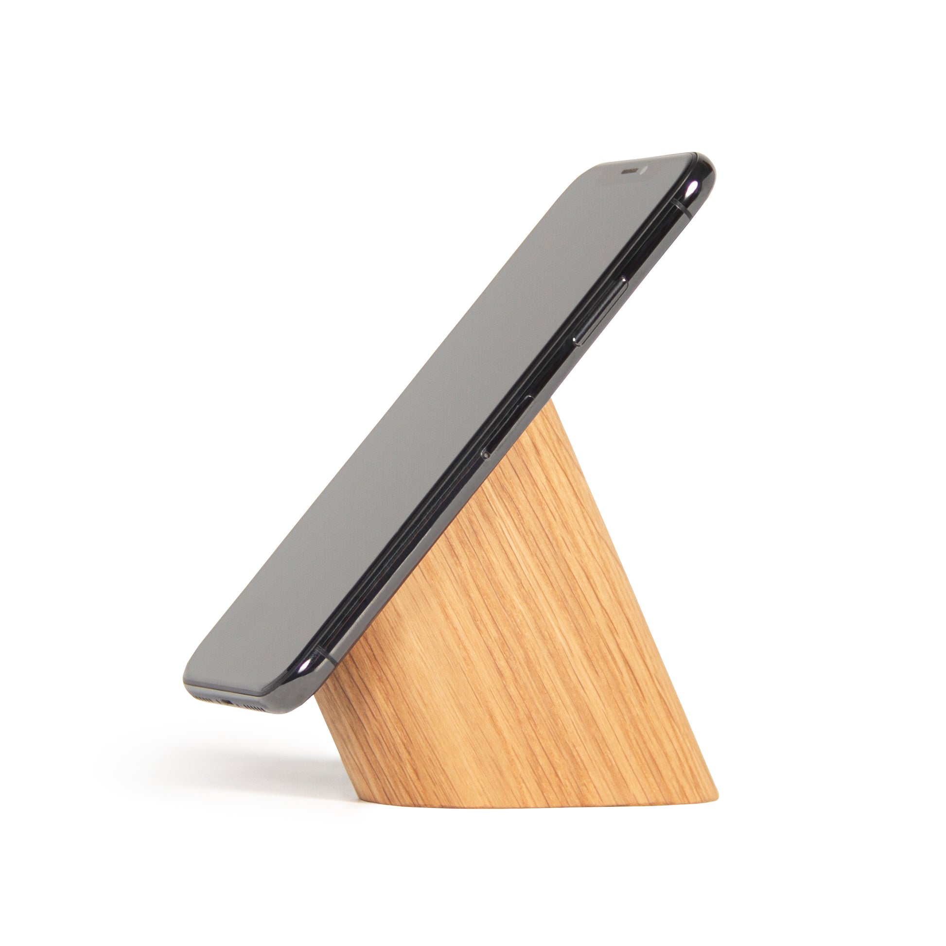 wooden smartphone stand with iPhone on it on white background