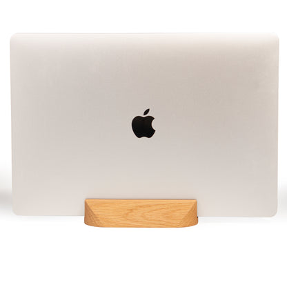 woodendot Loma in oak with MacBook Pro on top in front of a white background