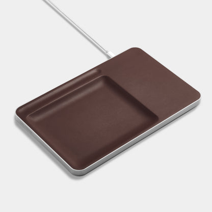 Chocolate Leather charging station over white background