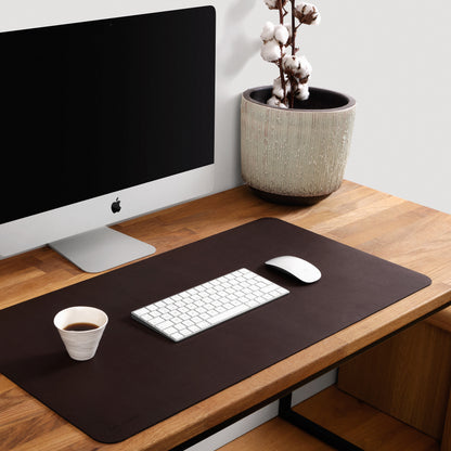 dark brown leather desk mat next to apple iMac on wooden desk