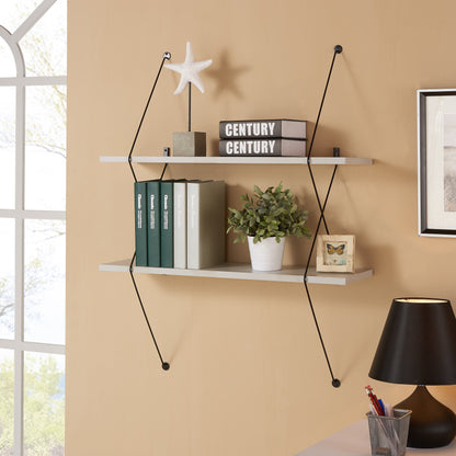 contemporary shelving on a yellow wall with accessories on top