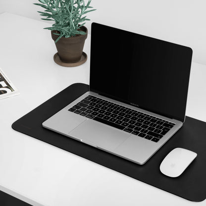 black leather desk mat on white background
