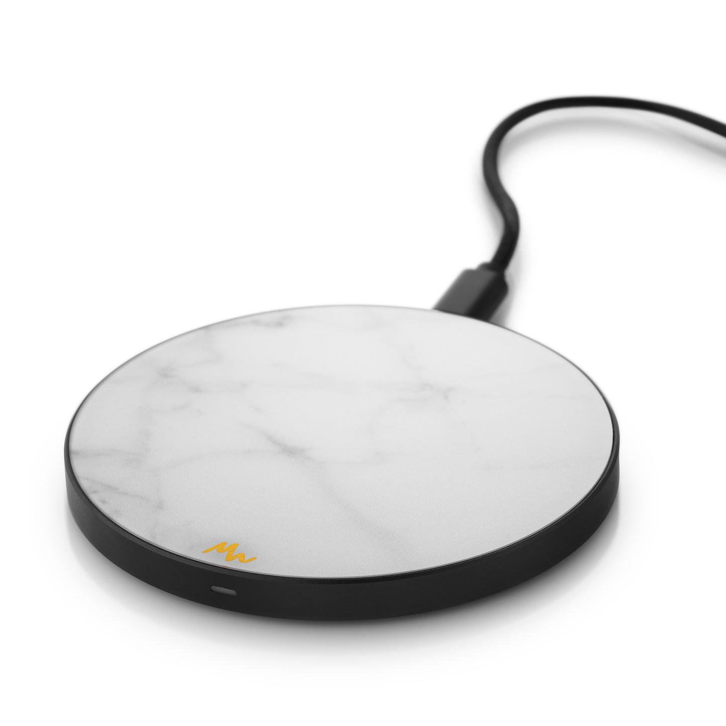 white and black Qi wireless mobile phone charger on white background