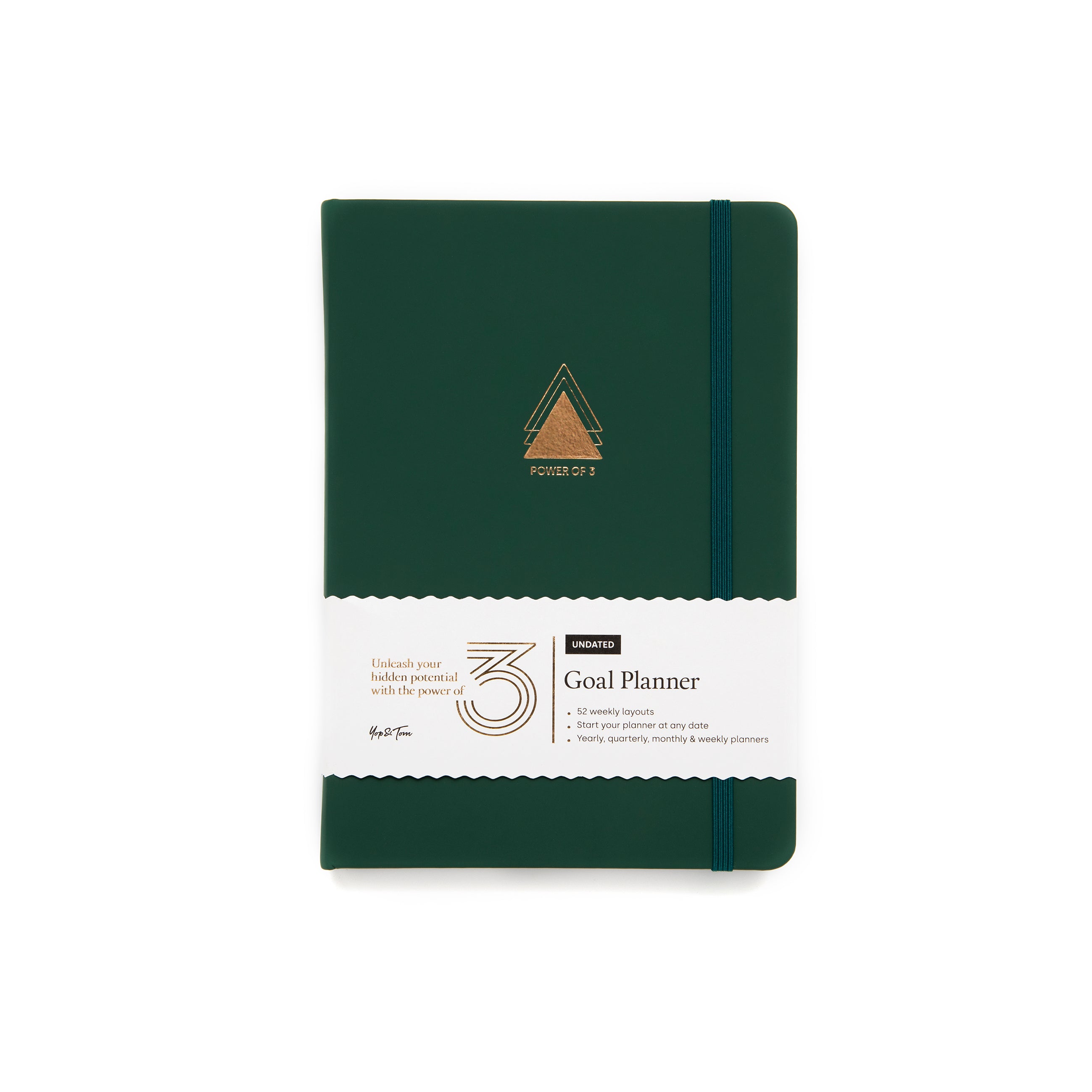 green version of the a5 goal planner, with gold power of three triangle on the front