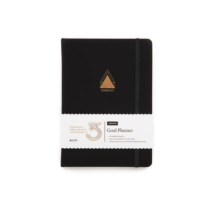 black version of the yop and tom a5 goal planner, on a white background