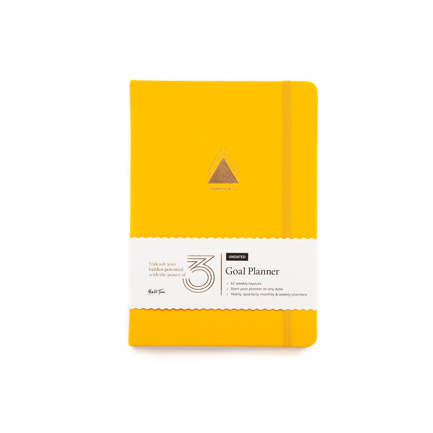 yellow a5 goal planner by yop and tom, on a white background