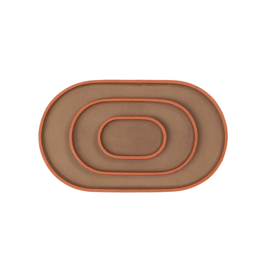 trio of tray organisers in brown leather on white background