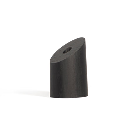 sima pen stand in black over a white background