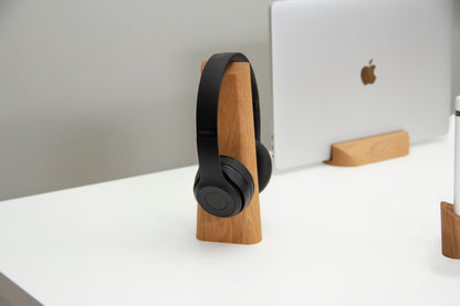 Woodendot Mallo stand in the centre flanked by the Sima Apple Pencil holder and a MacBook Pro on a white office desk
